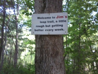 welcoming sign to jims trail in rockland