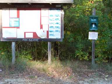 Kiosk at unused parking area at Cranberry Watershed Preserve.