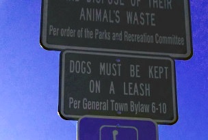 Sign at Forge Pond Park reminding dog owners of their responsibility.