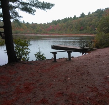 Picturesque Holly Pond in the fall at Wompatuck State Park.