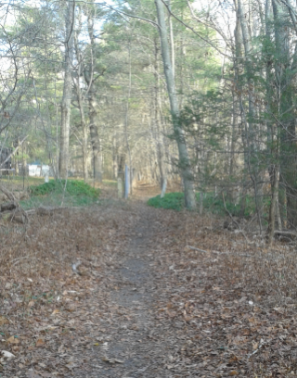 trail leads thru double granite posts on indian head trail