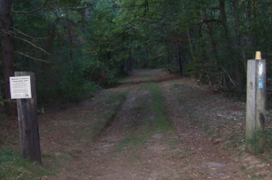 Bay Circuit Trail enters Thaddeus Chandler Sanctuary on a wide road