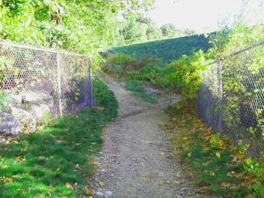 The trail up to the top of the Aaron Reservoir dam.