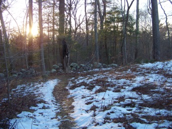 canoe club trail follows thru stone wall