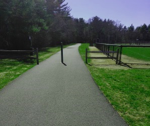 Forge Pond Park walking trail leading to the Rockland Fireworks Trail.