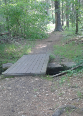 bridge into luddams ford park on indian head trail