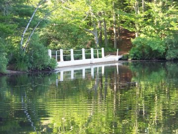 bridge leading to island in jacobs pond