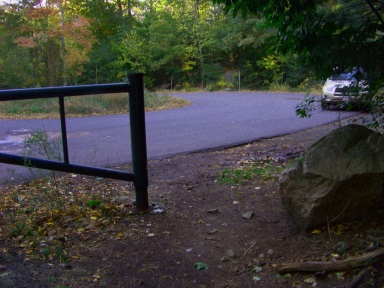 Parking area at the Leavitt St entrance to Wompatuck State Park.