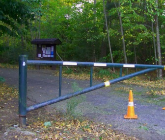Gate and kiosk at the Leavitt St entrance to Wompatuck State Park.