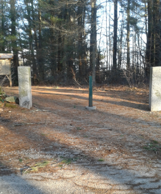 granite posts mark the entrance to Two Mile Farm in Marshfield